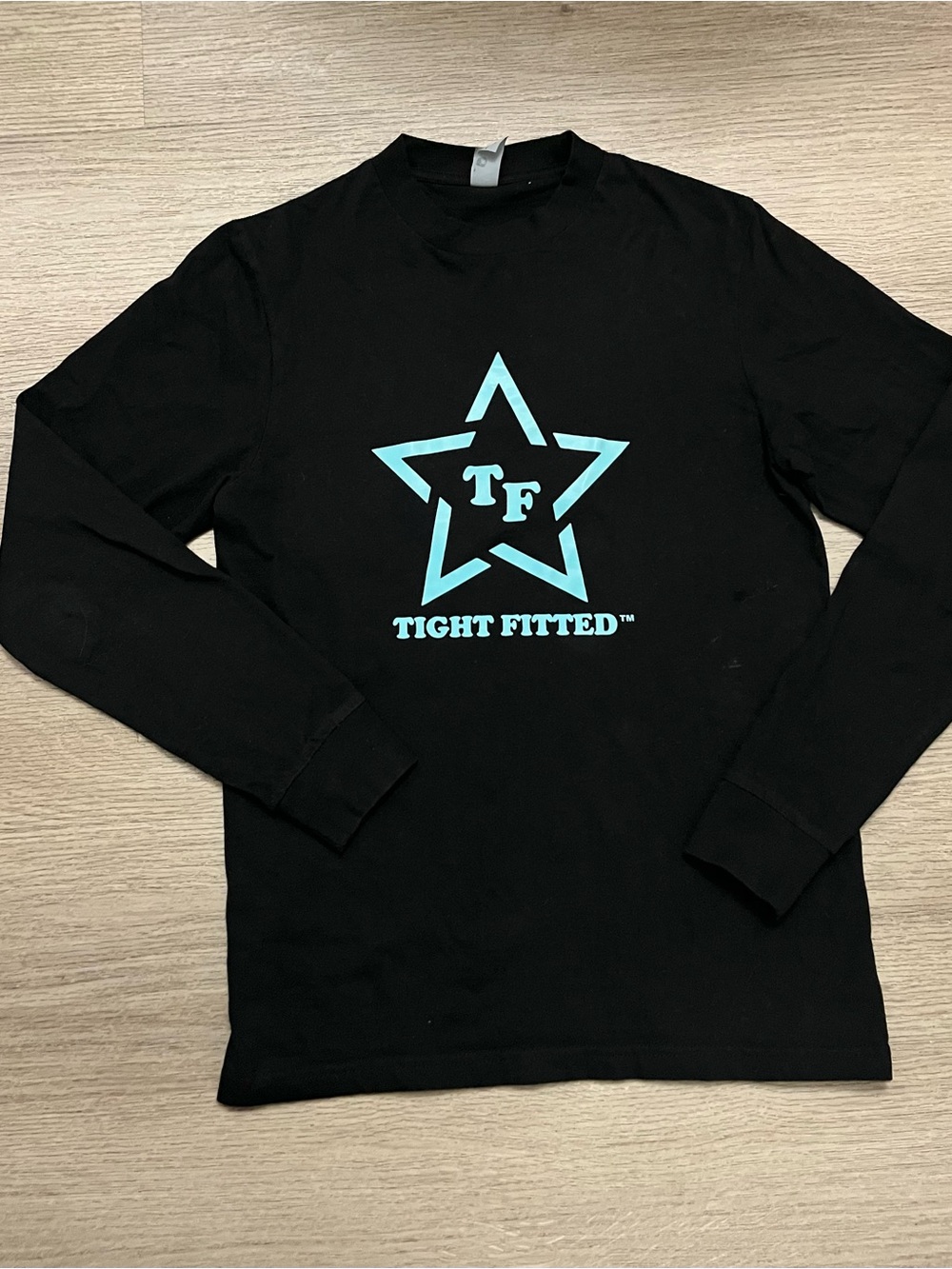 Tight Fitted™ Men’s Black Long Sleeve Tee with Aqua Star Logo